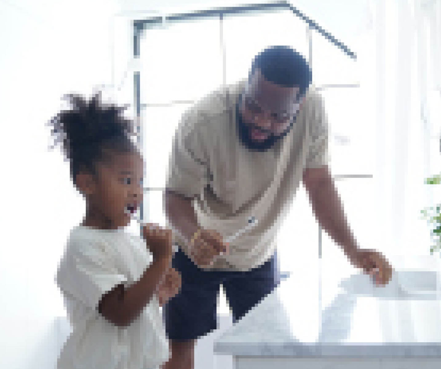 Father and daughter doing brushing in bathroom, little girl kid cheerful to preparing brushing with her father in the bathroom, backlight photography shooting
