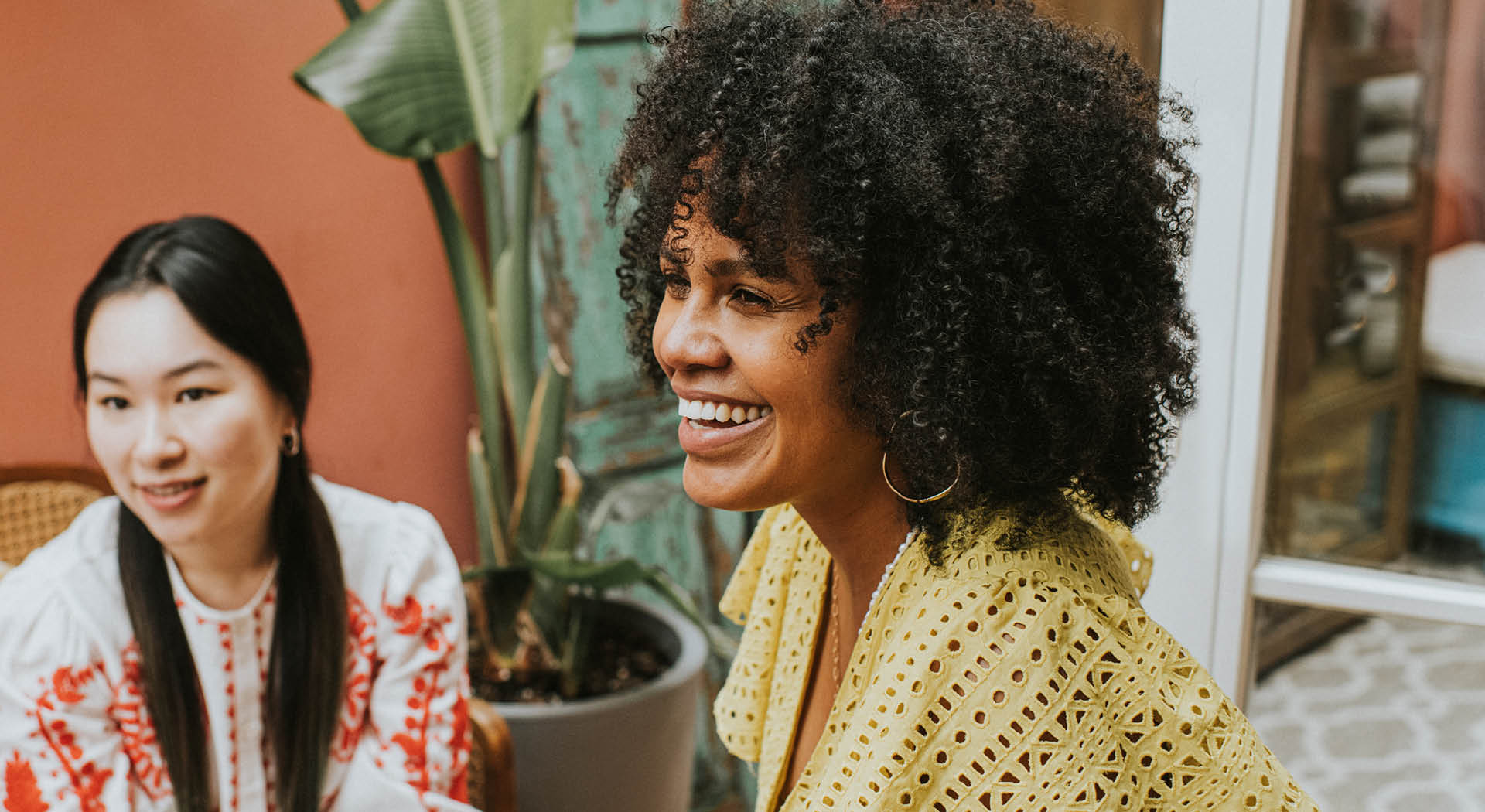 Photo of African American woman in meeting