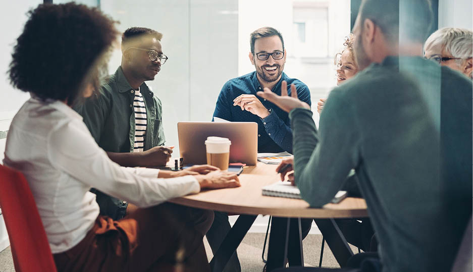 Multi-ethnic group of business persons having a meeting in the office