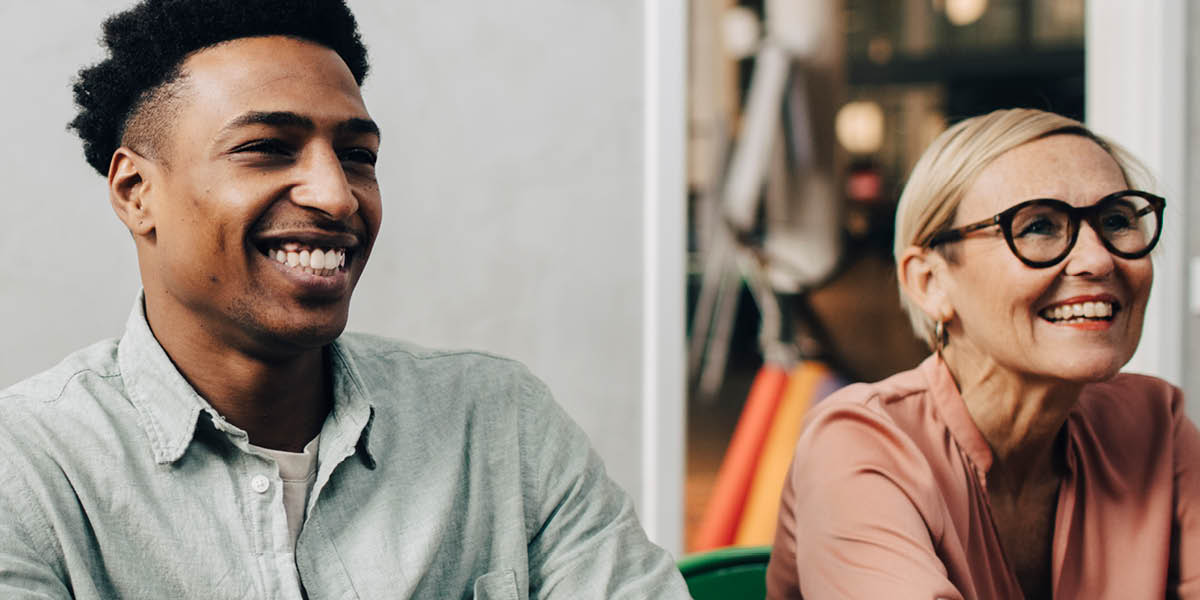 Photo of two women admiring baby bump