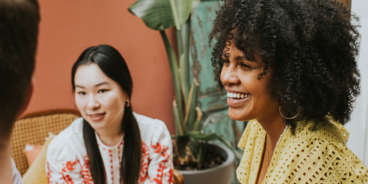 Photo of two female employees in a meeting